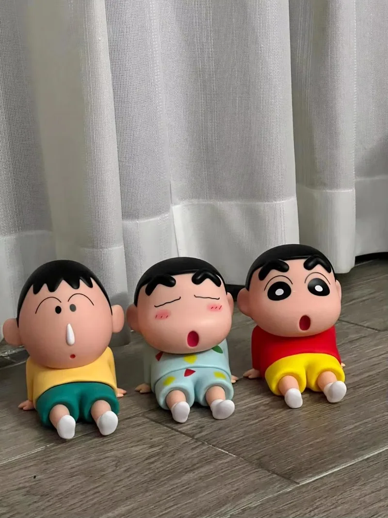 حامل هاتف على شكل شخصية كرايون - مراجعة Vinyl Figure Blank وسعره
